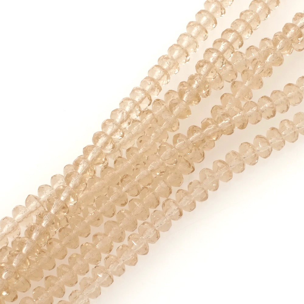 Fil de perles de Bohème Donuts facetté 3x5mm beige transparent