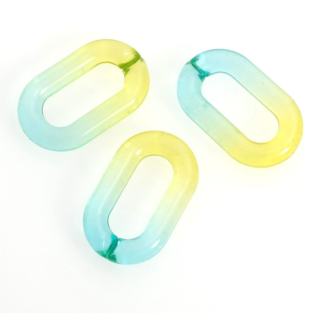 2 maillons ovale 39mm en acétate transparent dégradé jaune turquoise