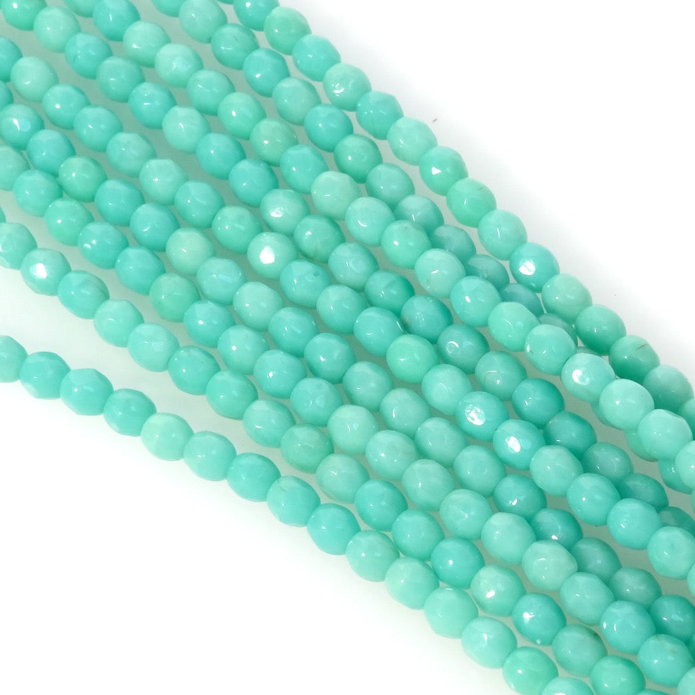 Fil de perles de Bohème rondes facettées 4mm turquoise opaque