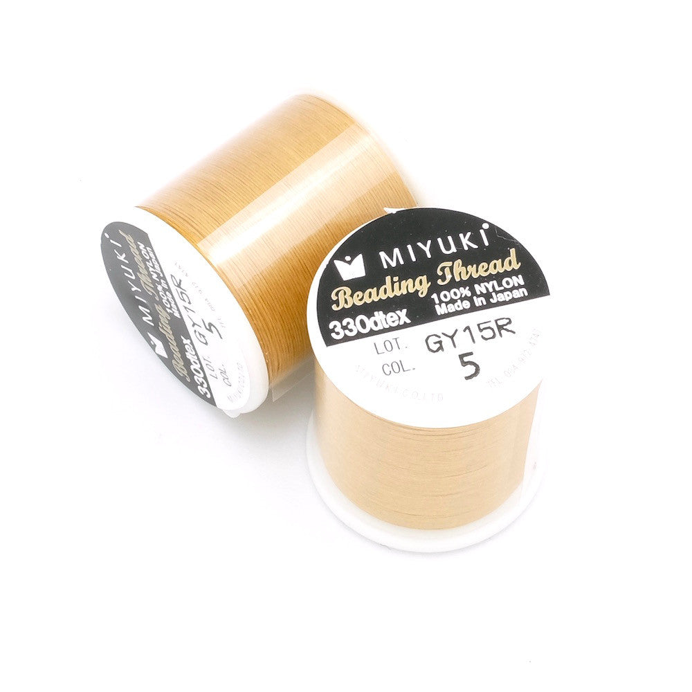 Bobine de 50 mètres de fil nylon Miyuki Beading thread 0,25mm Gold N°5 